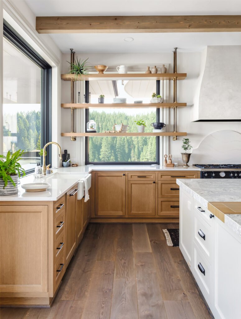 Traditional kitchen in new luxury home with hardwood floors, woo